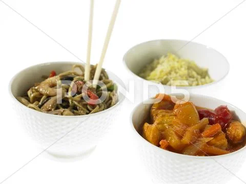 Three bowls of Chinese Takeaway with chopsticks Stock Photos