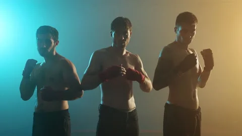 Three Boxers Stand In Ring. Stock Footage 160761006