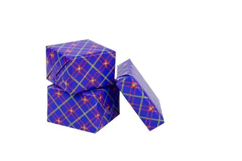 Three boxes of gifts packed in festive blue packaging, white background. Stock Photos