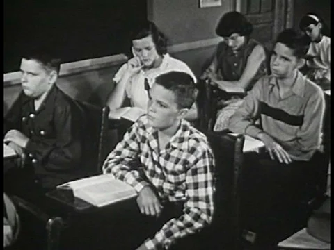 Three boys contemplate the consequences of deploying a stink bomb at schoolƒ Stock-Footage 75308109