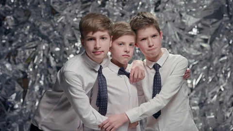 Three Boys On Shiny Background. New Year Celebration. Vídeos de archivo 180362499