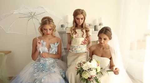 Three bride looking at the camera Stock Footage 64159087