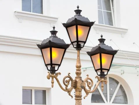 Three bright forged lights Stock Photos