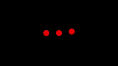 Three Bright Red Dots on Black Background Stock Footage 332984292