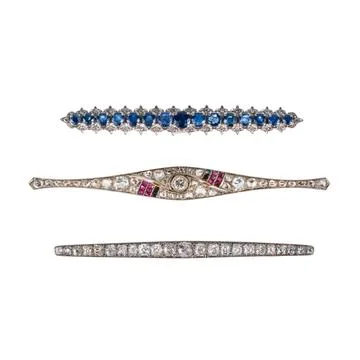 Three brooches with diamonds Stock Photos