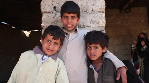 Three brothers posing in a bedouin camp, Hurghada, Egypt Stock Footage 38349130