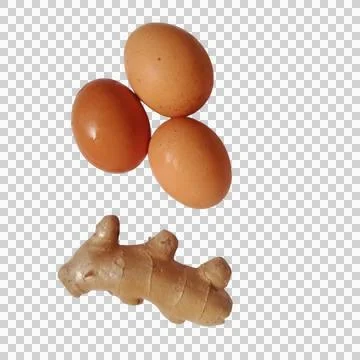 Three brown chicken eggs and a piece of fresh raw ginger root for cooking a.. Фото
