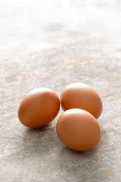 Three Brown Chicken Eggs with Copy Space Stock Photos