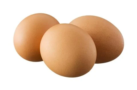Three brown eggs isolated on white background Stock Photos
