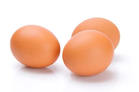 Three brown eggs isolated on white 스톡 사진