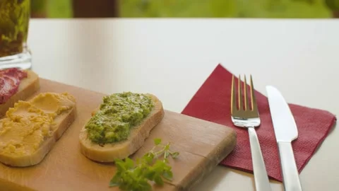 Three bruschetta with vegetable pate Stock Footage 137629167