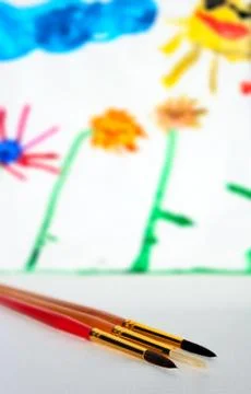 Three brushes on a paper Foto stock