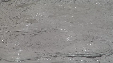 Three Bubbles Of Mud Boiling Stock Footage 11442769