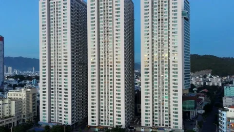 Three buildings background mountains 動画素材 162979424