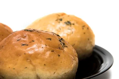 Three buns on a plate Stock Photos