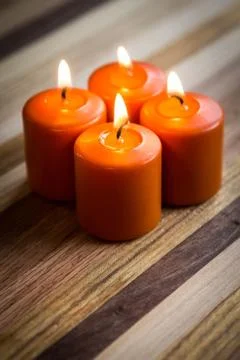 Three burning candles Fotos de archivo