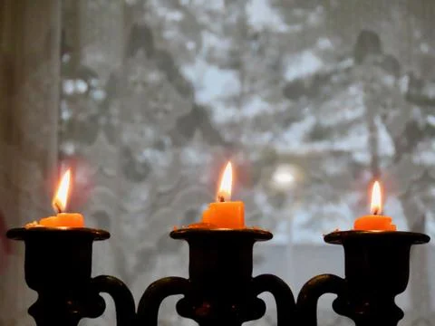 Three burning candles Stock Photos