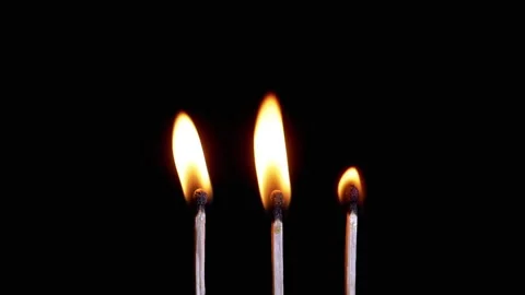 Three Burning Matches with a Bright Flame on a Black Background in Empty Space Stock Footage 253773436