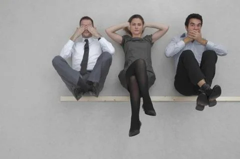 Three business people, See no evil, hear no evil, and speak no evil, elevated Stock Photos