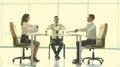 The three business people at the table throw papers. slow motion 4k or 4k+ Resolution