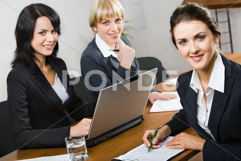 Three business women are planning their work Stock Photos