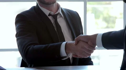 Three businessmen handshake Stock Footage 43089121