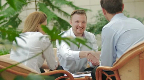Three businessmen shook hands each other Video stock 57459069