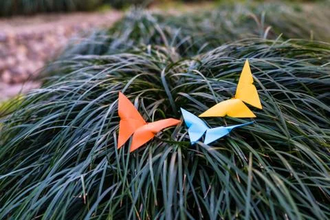 Three butterfly on the grass - paper work Stock Photos