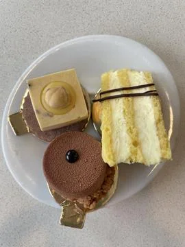 Three cakes in a plate Stock Photos