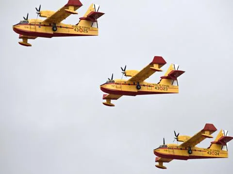 Three Canadair CL-215T amphibians in echelon over Torrejon Fotos Stock