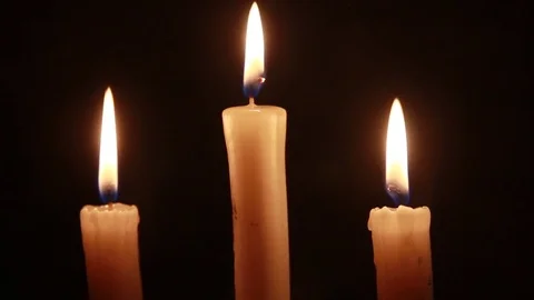 Three candles and a breeze Stock Footage 84572618