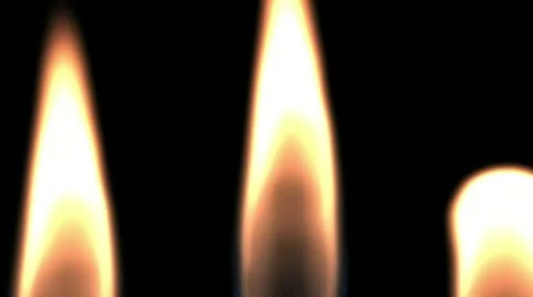 Three Candles Burning And Camera Movement Stock Footage 21024329