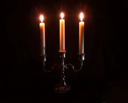 Three candles in candelabrum Stock Footage 701915