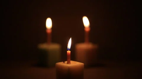 Three candles Stock Footage 42386638