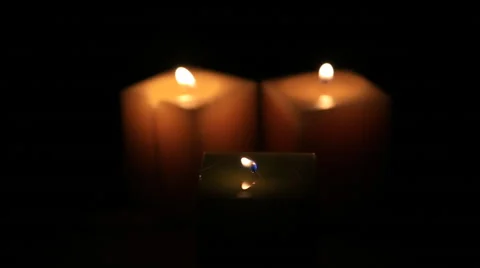 Three candles Stock Footage 42386793