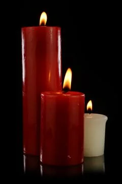 Three Candles Lit Stock Photos
