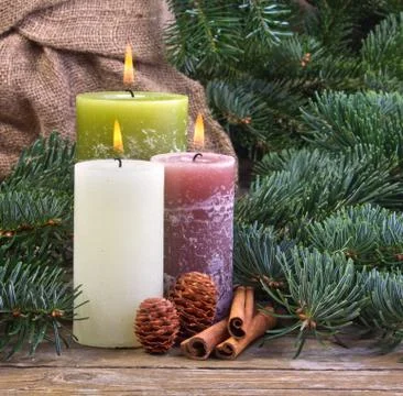 Three candles Stock Photos