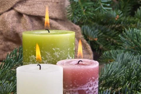 Three candles Stock Photos