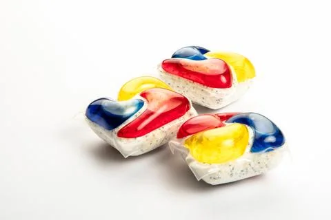 Three capsule for the dishwasher on the white background Stock Photos