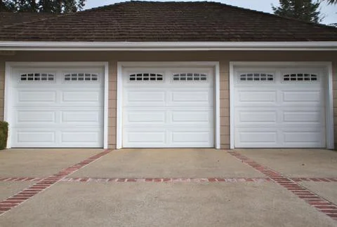 Three car garage close Stock Photos