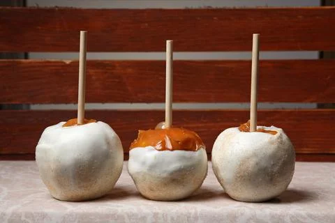 Three carmel apples Stock Photos