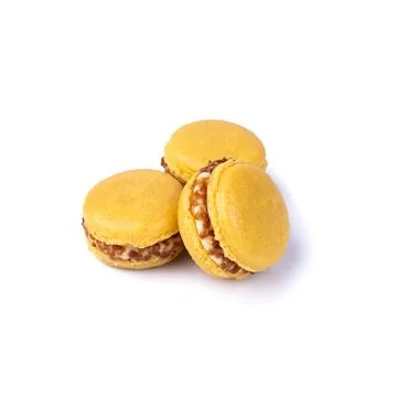 Three cashew nut macarons isolated over white background Stock Photos