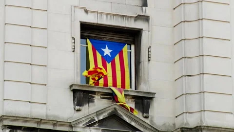Three Catalan Flags in One Window Stock Footage 260471974