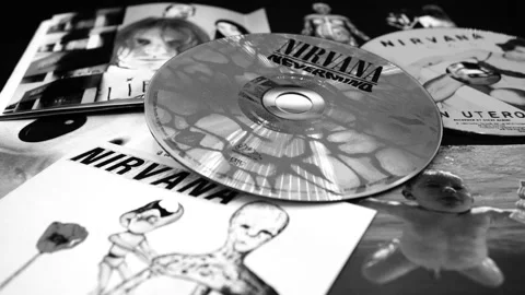 Three CD artwork of the famous American group NIRVANA Stock Footage 153290662