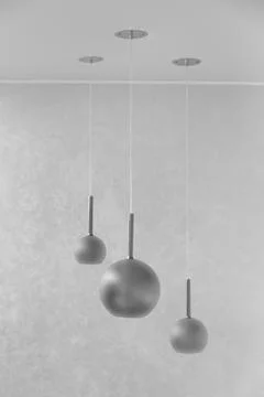 Three chandeliers on a gray background Stock Photos