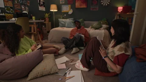 Three Cheerful Students Studying In Dorm Room Stock Footage 303391554