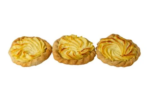 Three cheesecakes with potatoes, white background Stock Photos