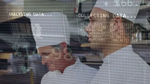 Three chefs watching kitchen as HUD charts overlaying team, gathering data Stock Footage 333154851