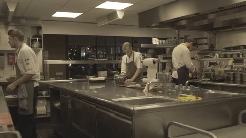 Three Chefs Working in the Kitchen 스톡 동영상 118205479