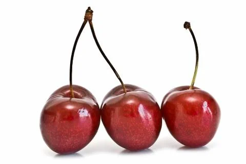 Three cherries. Stock Photos